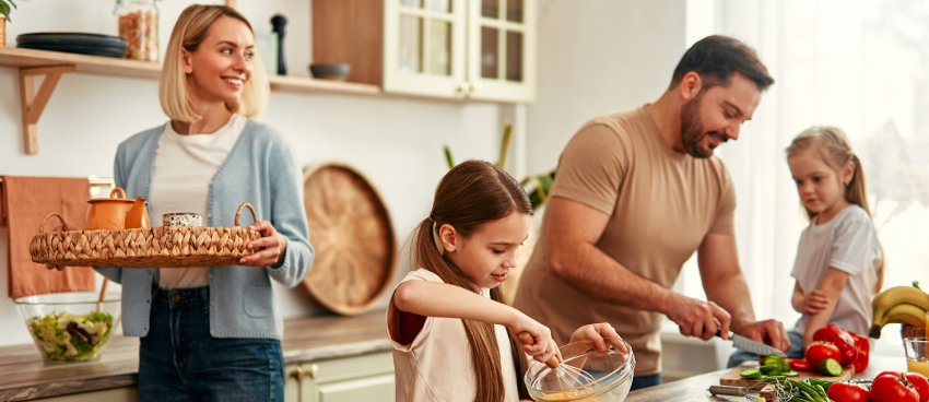 Healthy family preparing dinner with the addition of CBD